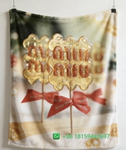 Miumiu Throw Blankets